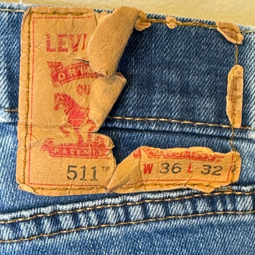 Levi’s 511 Perfect Medium Wash Thrashed Distressed High Rise Slim Tapered Jeans